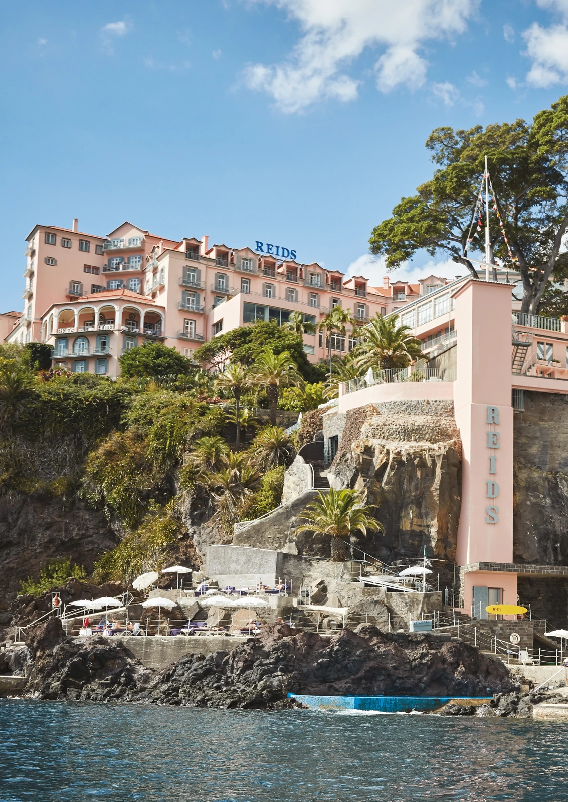 Reid's Palace on the clifftop above Funchal Bay, with its pool terrace over the Atlantic, Madeira