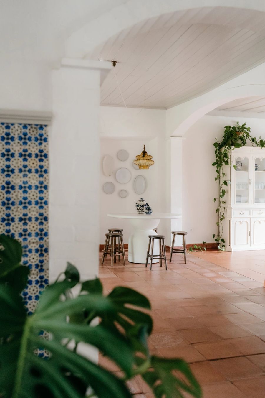 Interior dining room with azulejo wall at Casa Sacoto near Lisbon