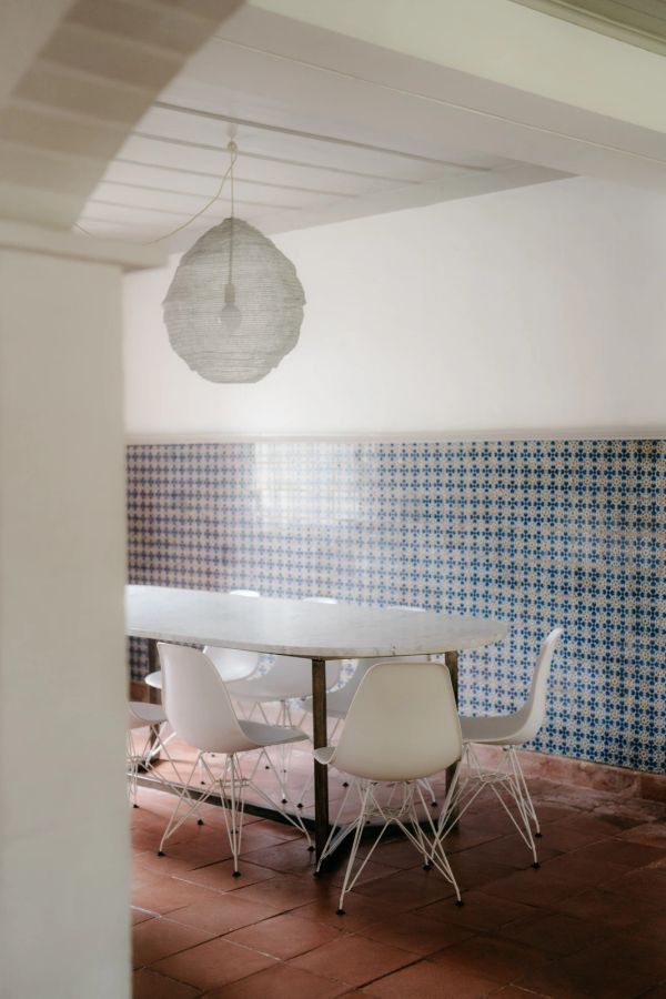 The dining room, set for a wedding dinner at Casa Sacoto near Lisbon