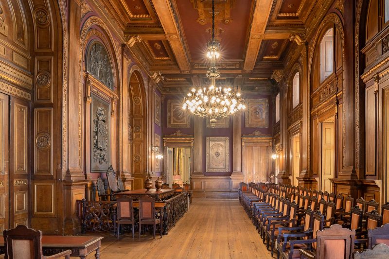 The Assembly Hall at Palácio da Bolsa arranged for a small wedding gathering with freestanding decor.