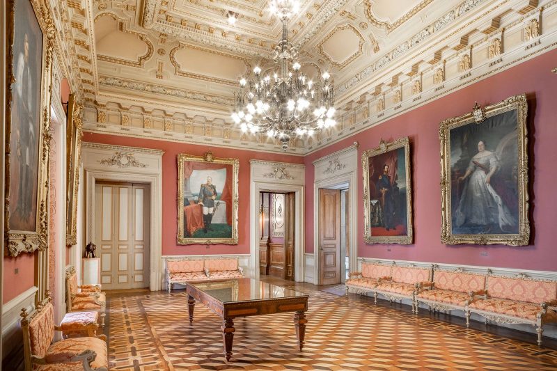 The Portrait Room at Palácio da Bolsa set for a small family wedding dinner in Porto.