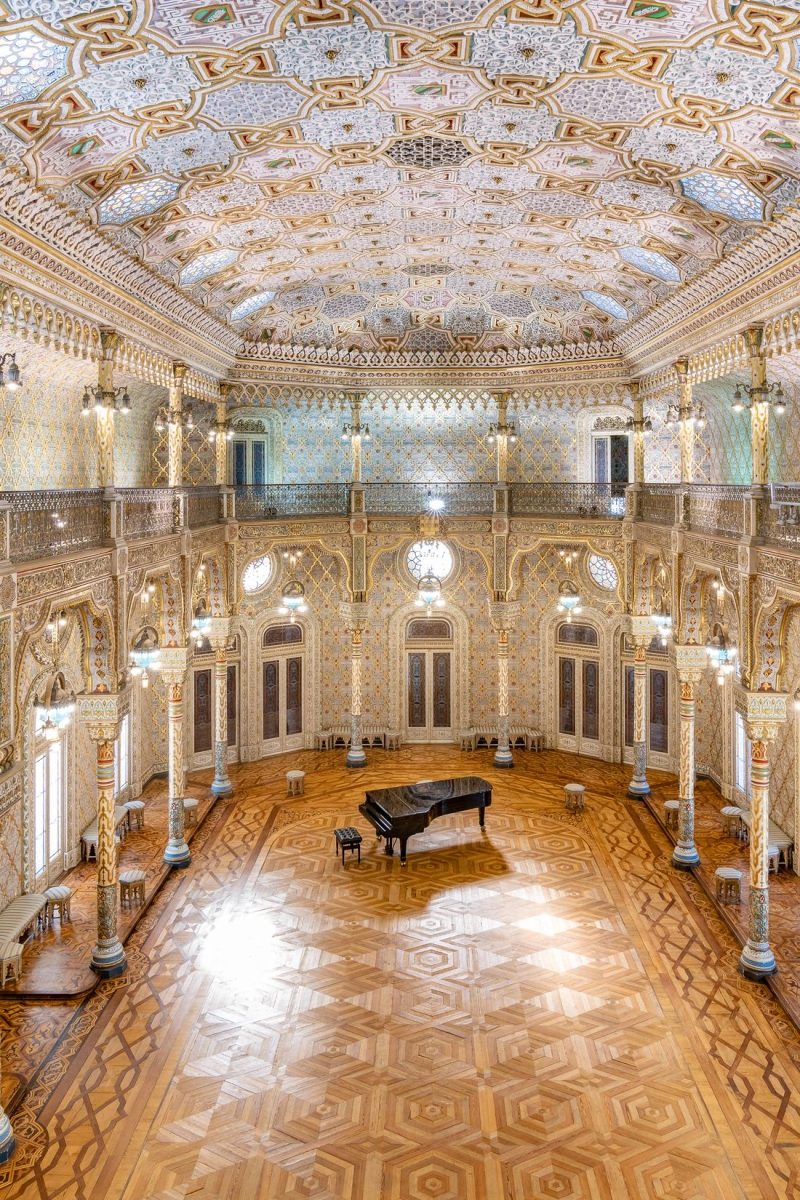 The Salão Árabe at Palácio da Bolsa prepared for an intimate wedding dinner inside the Moorish-revival hall.