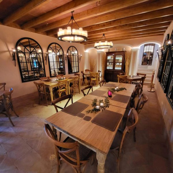 The Adega at Quinta da Bella Vista, Sintra, a wine-cellar tavern with vaulted ceiling set for a wedding dinner