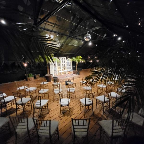 Victorian greenhouse at Quinta da Bella Vista, Sintra, a night wedding dinner under chandeliers and glass