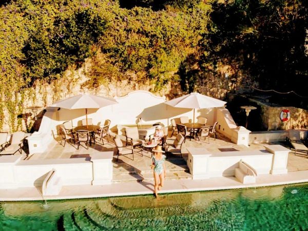 Palacio Pool at Quinta da Bella Vista in golden evening light with lounge seating