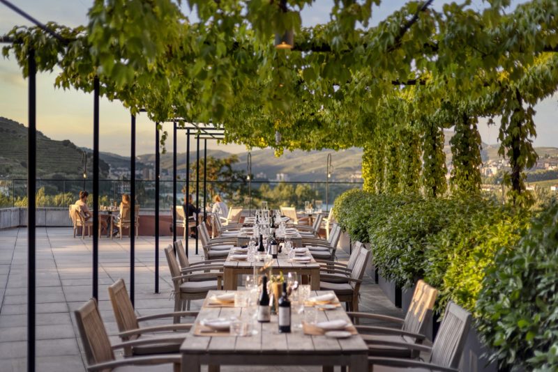 Wine Library terrace overlooking the vineyards at Six Senses Douro Valley, UNESCO Douro