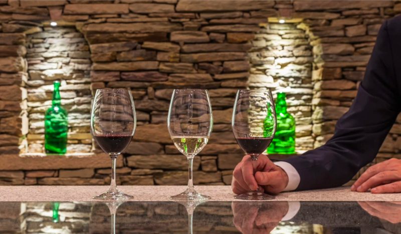The Yeatman wine cellar with over 25,000 bottles, set for a sommelier-led wedding welcome tasting at the wine hotel in Vila Nova de Gaia, Porto